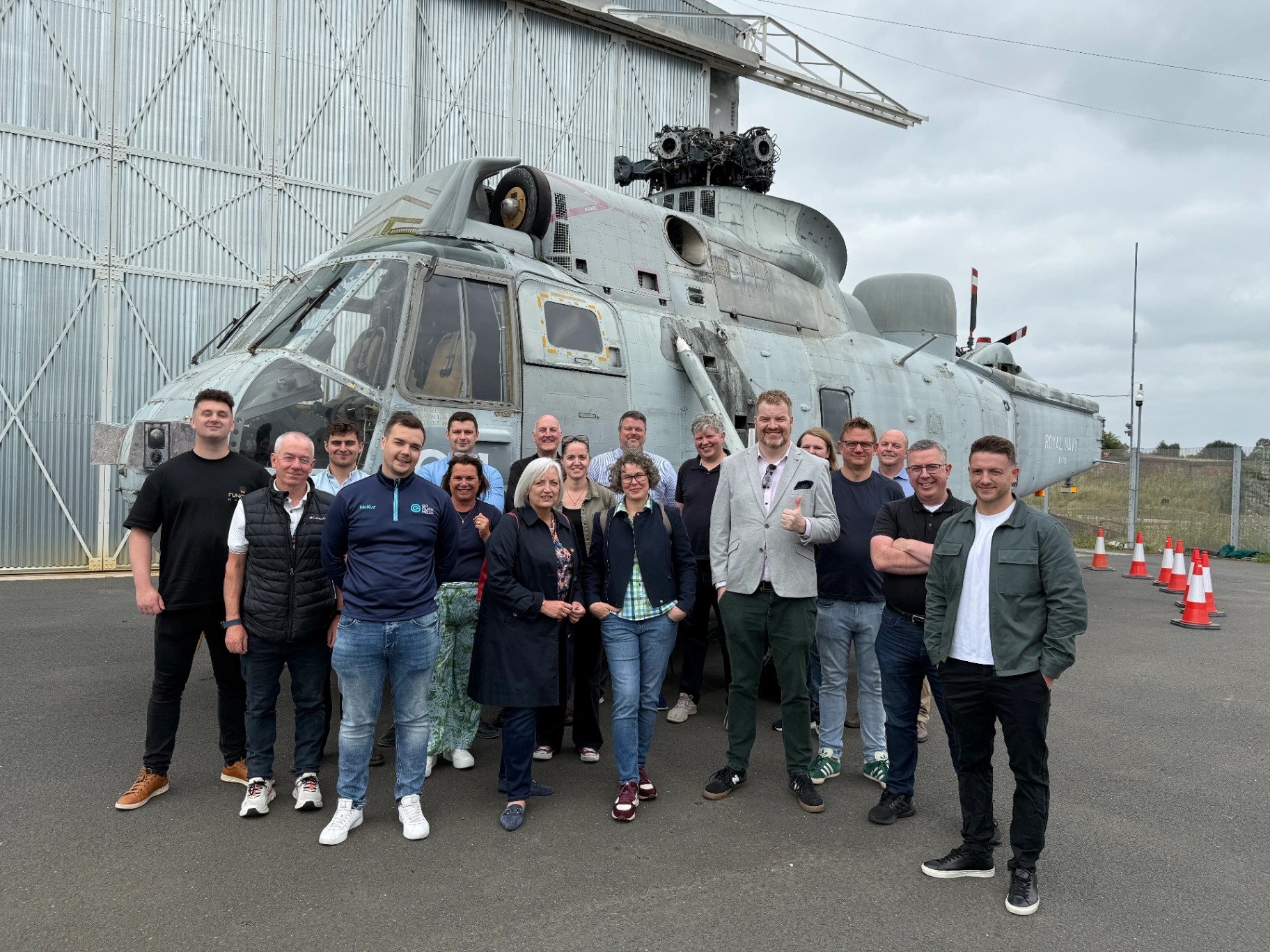 Growth Network members on a business tour at an aviation hangar