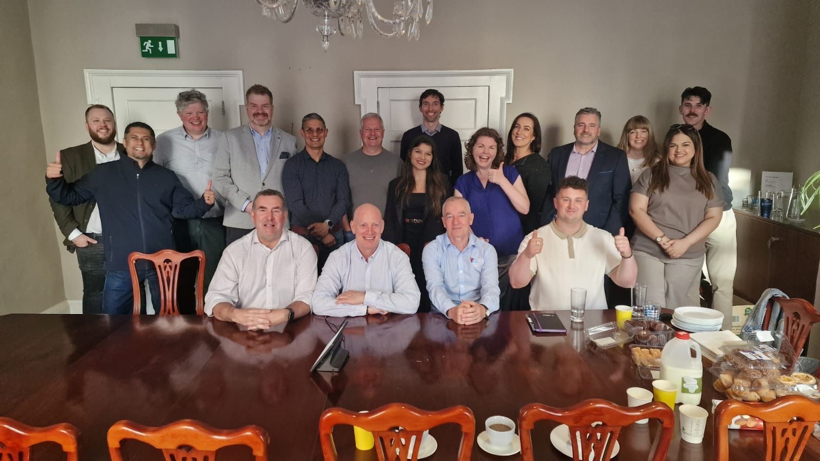 Growth Network members gathered around the table at a Dublin social